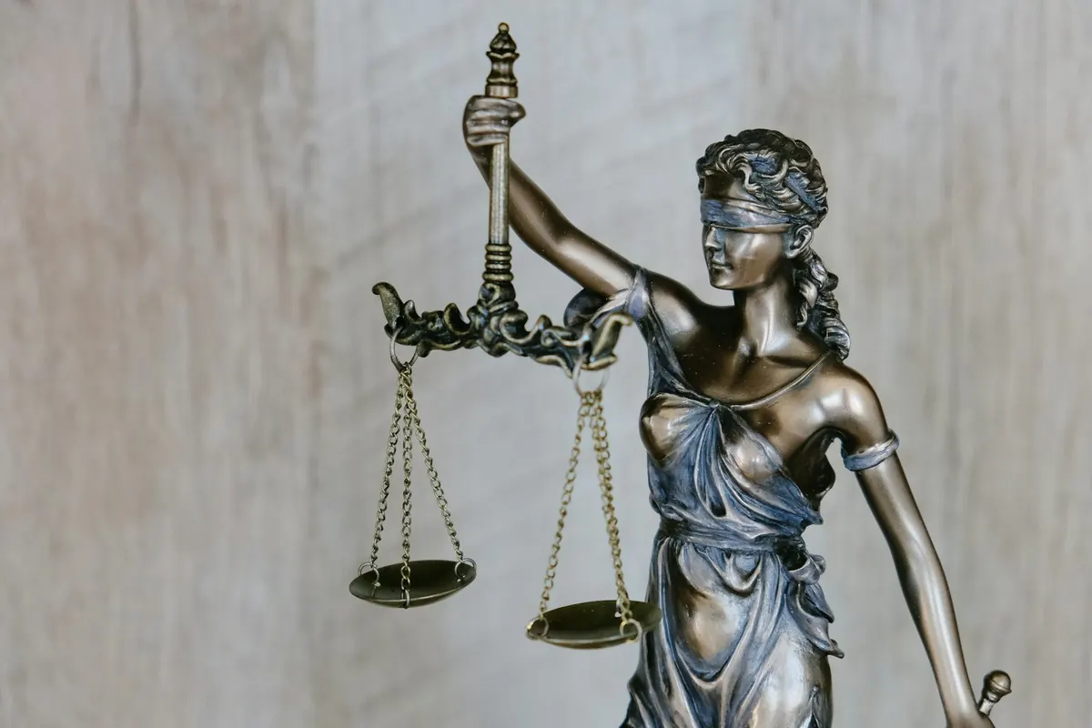 A statue of Lady Justice holding the scales